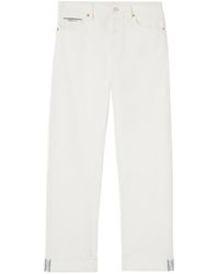 Gucci - Vintage Logo Printed Jeans - Lyst