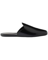 Prada - Embossed-Logo Leather Mules - Lyst