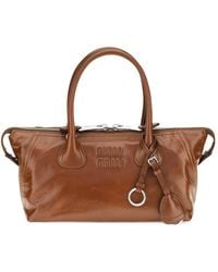 Miu Miu - Logo-Embossed Leather Tote Bag - Lyst