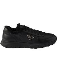 Prada - Triangle-Logo Lace-Up Sneakers - Lyst