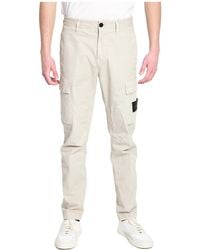 Stone Island - Logo Patch Tapered Leg Trousers - Lyst