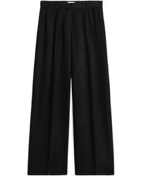 TOTEME - Totême Pleated Wide-Leg Pants - Lyst