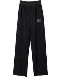 we11done - Logo Patch Casual Pants - Lyst
