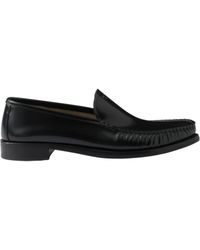 Prada - Logo-Debossed Ruched Loafers - Lyst