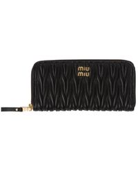 Miu Miu - Matelassé Zipped Wallet - Lyst