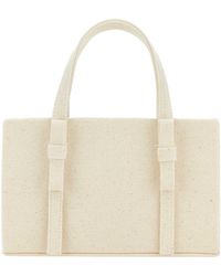 Kara - Chain-Linked Mini Top Handle Bag - Lyst