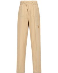 Prada - Triangle-Logo Plaque Wide-Leg Pants - Lyst