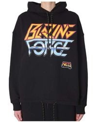 McQ - Pattern Printed Hooded Hoodie - Lyst