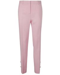 Versace - Button-Embellished Skinny Trousers - Lyst
