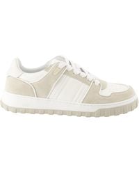 Ami Paris - Ami Logo Embossed Low-Top Sneakers - Lyst