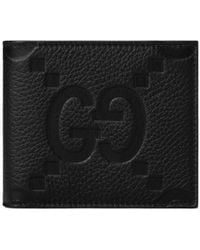 Gucci - Logo Embossed Bi-Fold Wallet - Lyst