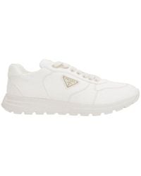 Prada - Triangle-Logo Lace-Up Sneakers - Lyst