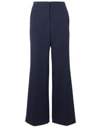 The Row - Logo Wool Twill Flared Dress Pants - Lyst