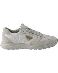 Prada - Triangle-Logo Lace-Up Sneakers - Lyst