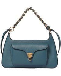 Coccinelle - Logo Printed Beat Shoulder Bag - Lyst