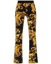 Versace Jeans Couture - Couture Logo Waistband Flared-Leg Trousers - Lyst