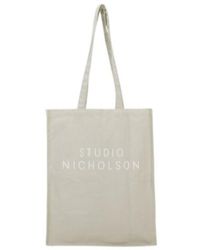 Studio Nicholson - Printed Logo Tote Bag - Lyst
