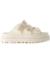 UGG - Goldenglow Logo Embossed Slides - Lyst