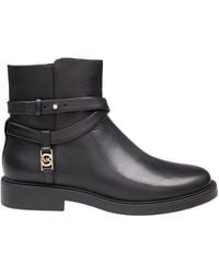 Michael Kors - Abigail Logo Plaque Ankle Boots - Lyst