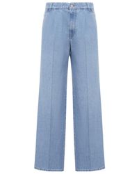 Miu Miu - Logo-Embroidered Baggy Jeans - Lyst