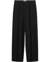TOTEME - Totême Wide Fluid Trousers - Lyst