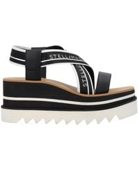 Stella McCartney - Sneak-Elyse Crossover Strap Platform Sandals - Lyst