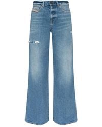 DIESEL - Distressed Flared Jeans - Lyst