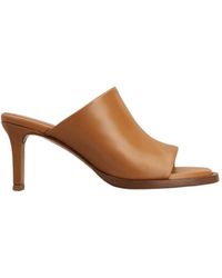 Tod's - Logo Debossed Slip-On Mules - Lyst