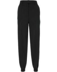 Prada - Tapered High-Rise Pants - Lyst