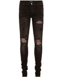 Amiri - Paisley-Patch Distressed Skinny Jeans - Lyst