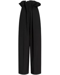 KHAITE - High-Waisted Pleated Trousers - Lyst