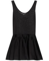 Alaïa - Short Dresses - Lyst