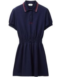 Versace - Logo-Embroidered Mini Polo Dress - Lyst