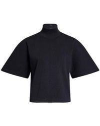 Alaïa - Alaïa Ribbed High Neck T-Shirt - Lyst