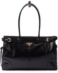 Prada - Triangle-Logo Drawstring Shoulder Bag - Lyst