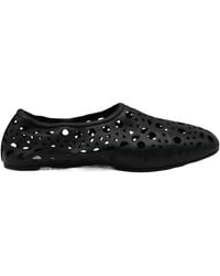 Alaïa - Alaïa Laser-Cut Flat Shoes - Lyst