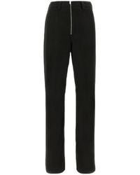 Ambush - Logo Embroidered Zip Up Trousers - Lyst