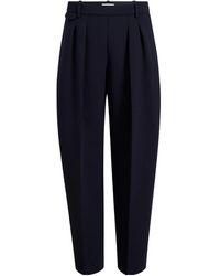 KHAITE - Dugan Pleated Trousers - Lyst