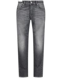 Pt Pantaloni - Pt Torino Logo Patch Mid-Rise Slim-Cut Jeans - Lyst