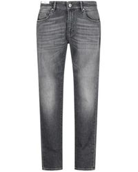 Pt Pantaloni - Pt Torino Logo Patch Mid-Rise Slim-Cut Jeans - Lyst