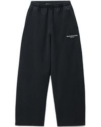 Alexander Wang - Logo-Print Mid-Rise Relaxed Sweatpants - Lyst