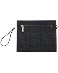 Ferragamo - Logo Embossed Clutch Bag - Lyst