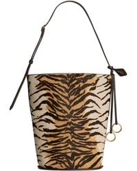 Alaïa - Alaïa Hip Small Bucket Bag - Lyst