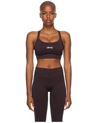 Reebok - Jacquard-Logo Sports Bra - Lyst