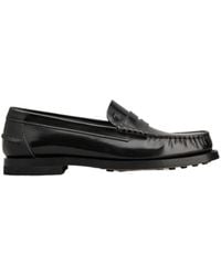 Tod's - Logo Embossed Penny Loafers - Lyst