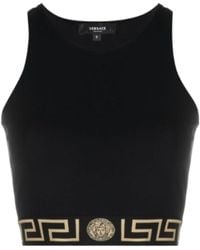 Versace - La Greca Cut-Out Stretched Sports Bra - Lyst