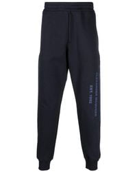 McQueen - Graffiti Logo Printed Sweatpants - Lyst