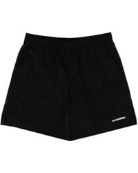 Jil Sander - Logo-Print High Waist Swim Shorts - Lyst