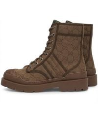 Gucci - Monogrammed Lace-Up Boots - Lyst