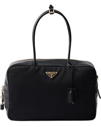 Prada - Large Re-Nylon And Leather Top-Handle Bag With Padlock - Lyst